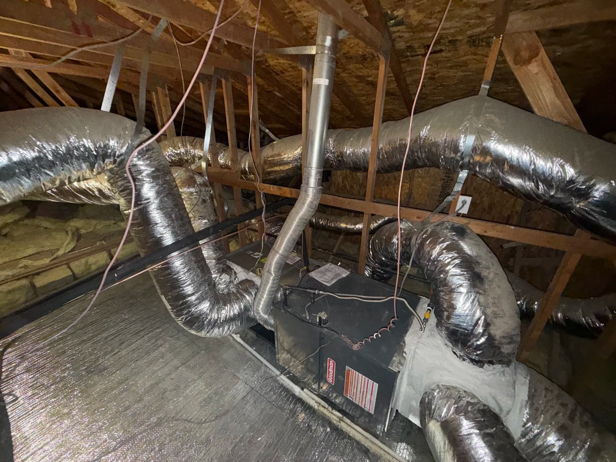 Attic furnace plenum with flex duct connections