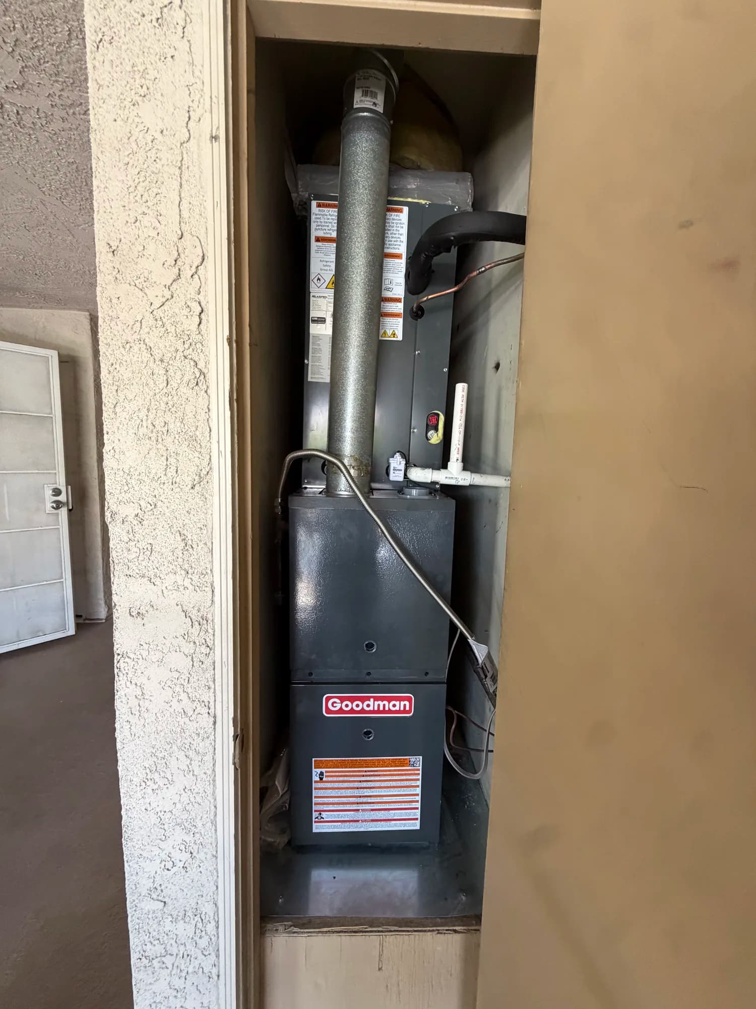 Goodman furnace closet install with new flue